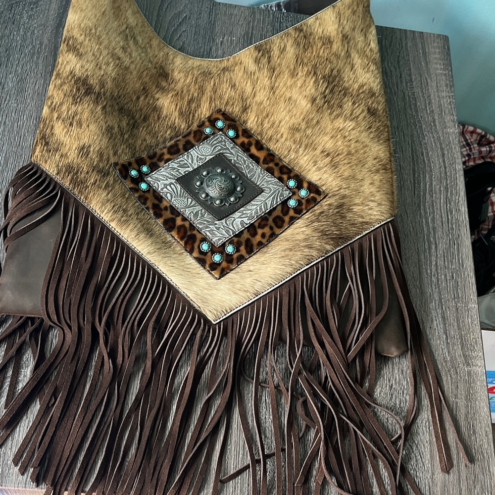 Fringe Cowhide Tote with Turquoise Concho Detail